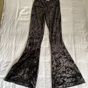 Black crushed velvet flare pants